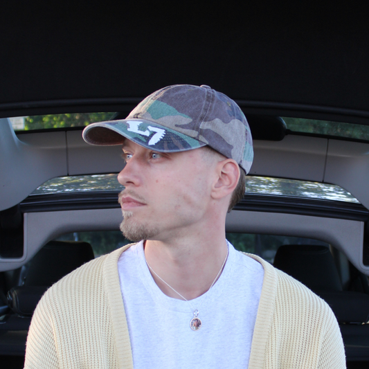Louis Zeven camouflage cap met camo-print, geverfd Louis Zeven-logo en verstelbare sluiting.