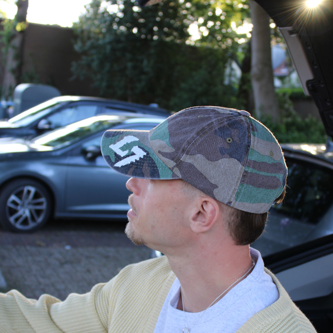 Louis Zeven camouflage cap met camo-print, geverfd Louis Zeven-logo en verstelbare sluiting.